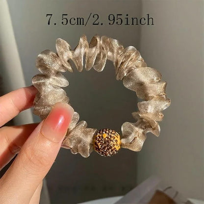 Élégants élastiques à cheveux en maille ornés de strass
