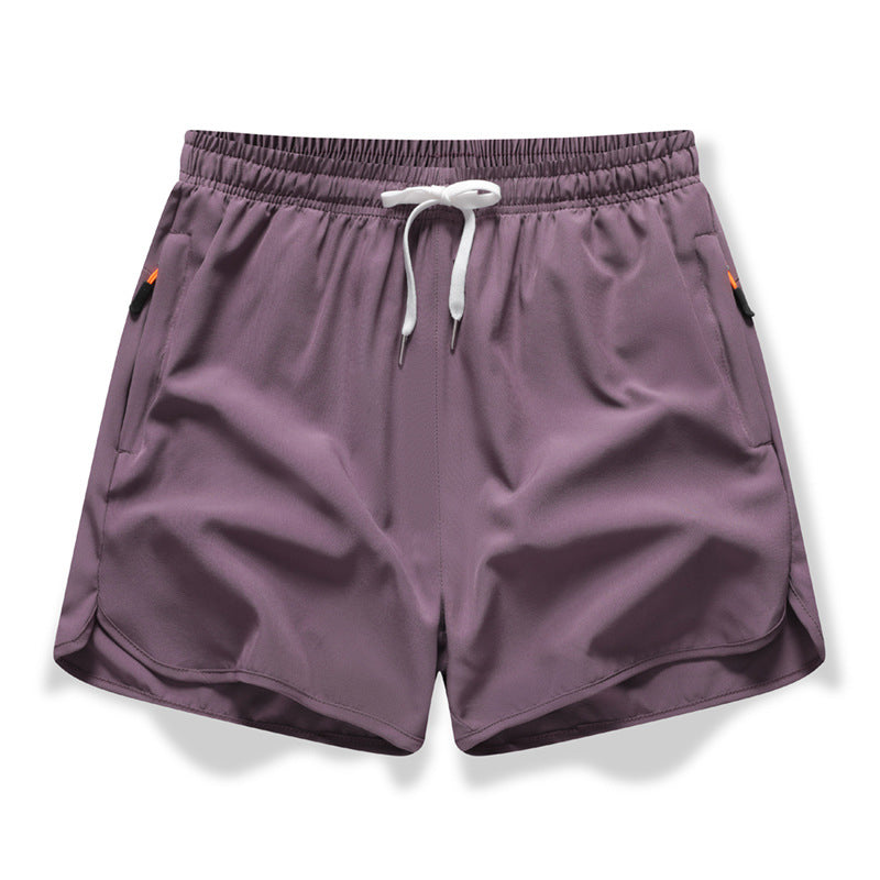 🏃  Short de sport respirant - poches zippées, taille élastiquée et séchage rapide