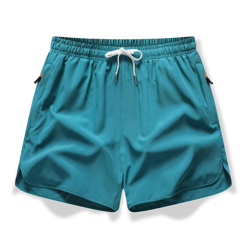 🏃  Short de sport respirant - poches zippées, taille élastiquée et séchage rapide